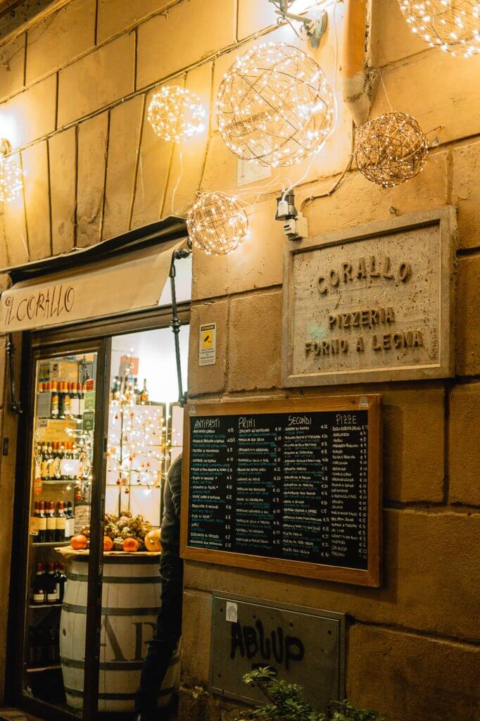 Entrance of Corallo Pizzeria - Forno a Legna. Restaurant in Rome