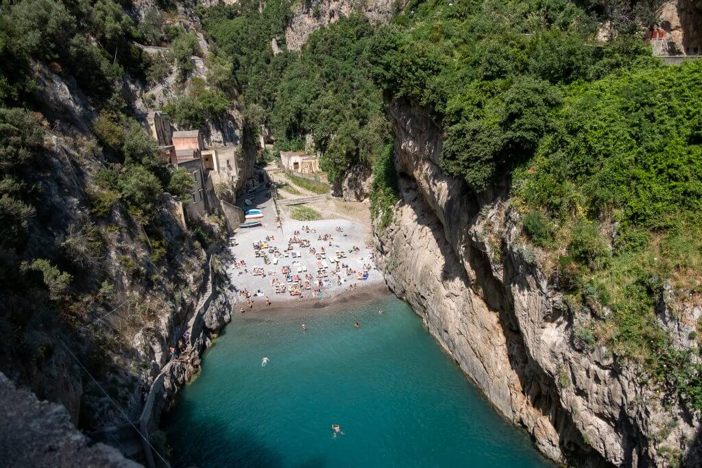 Breathtaking drone capture of Fiordo di Furore Beach, showcasing the serene beauty and accessibility of this hidden gem on the Amalfi Coast