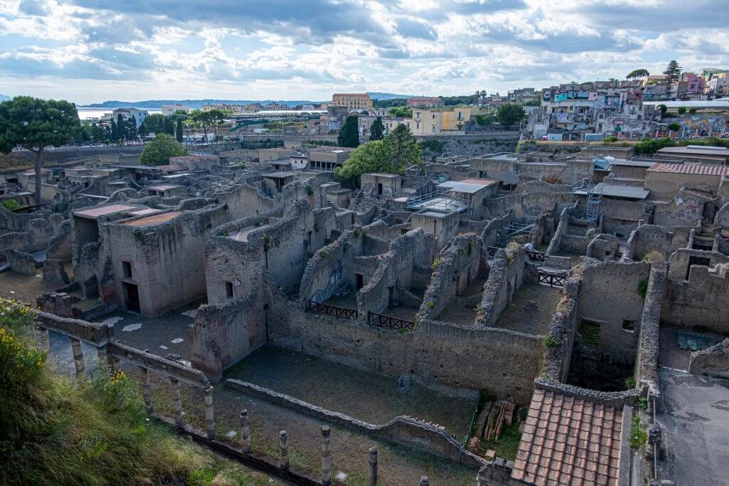 Panoramic view of the Archaeological Park of Herculaneum, offering a glimpse into ancient Roman life for history enthusiasts exploring the riches of Napoli and its surroundings.
