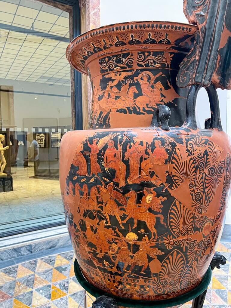 Ancient Amphora vase displayed at the Naples Archaeological Museum, symbolizing Roman pottery art.