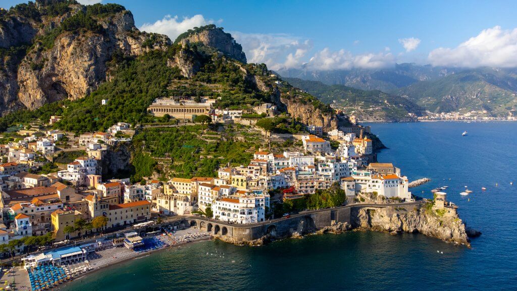 Drone shot capturing Positano's cliffside beauty, a picturesque destination on the Amalfi