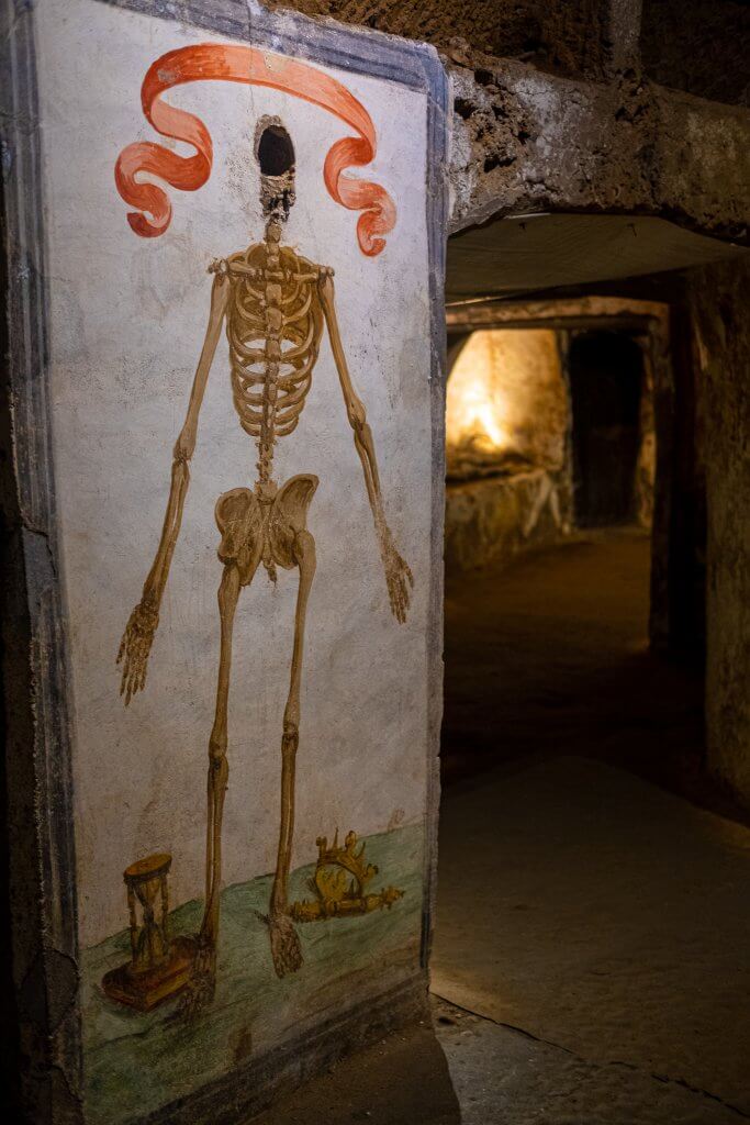 The serene and historic San Gaudioso catacombs in Naples, a symbol of equality in death.